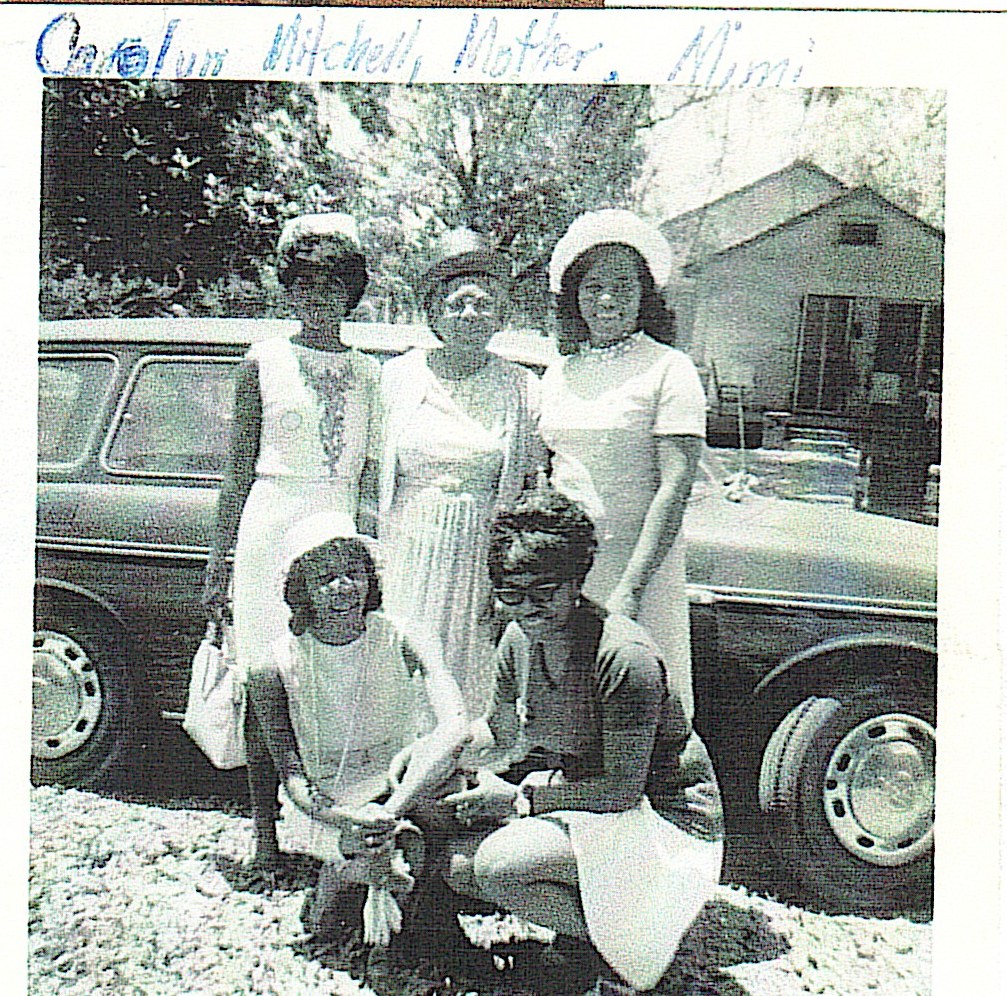 Historical family photograph of women gathered outdoors